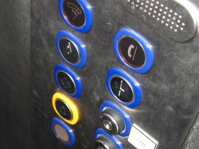 [Photo of lift buttons]